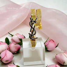 Front view of gold Saint Laurent inspired double band zircon ring – Misk Shop
