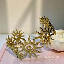 Gold plated women bracelet inspired by sun rays design