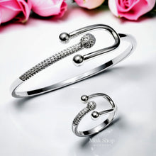 Close-up of Misk Shop Tiffany inspired white gold plated copper bangle and ring set with high-clarity zircon