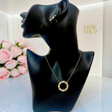 Tiffany-inspired two-tone zircon circle pendant necklace on display