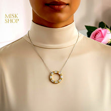 Medium-length two-tone zircon circle necklace worn