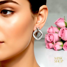 Silver Tiffany-inspired zircon X drop earrings worn
