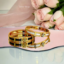 Misk Shop Tory Burch inspired 18K gold plated enamel bangle in ivory white and black color options