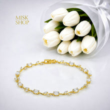 Gold-tone tulip vine bracelet with clear zircon stones