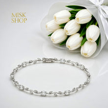 Silver-tone tulip vine bracelet with clear zircon stones