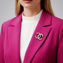 Handcrafted white gold plated Chanel-inspired brooch with pearls and zircon stones by Misk Shop.